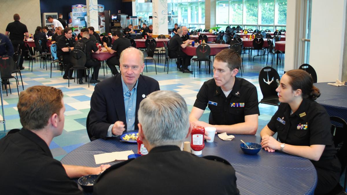 Bill meeting with interns.